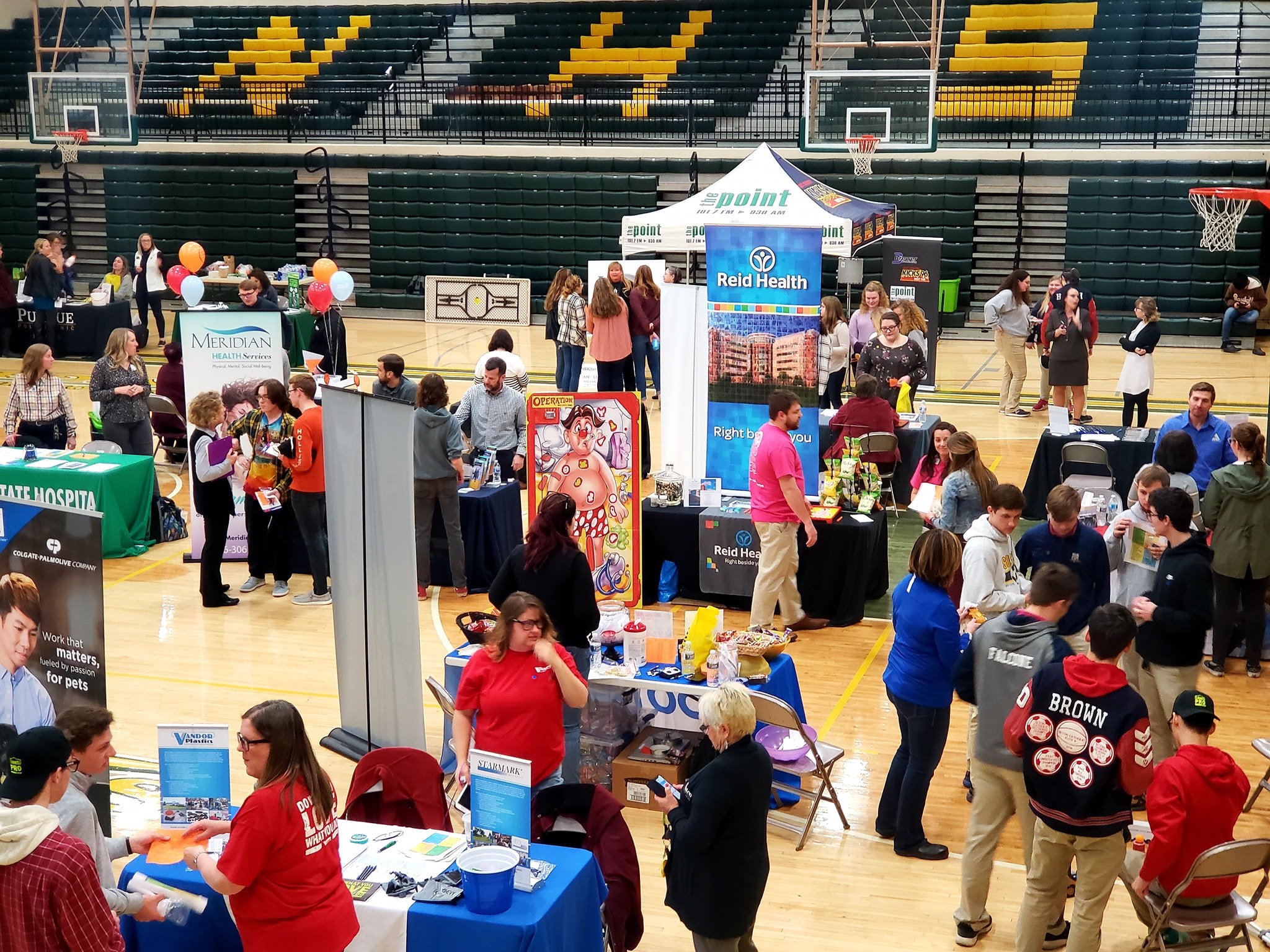 A job fair held in a highschool gym in East Central Indiana