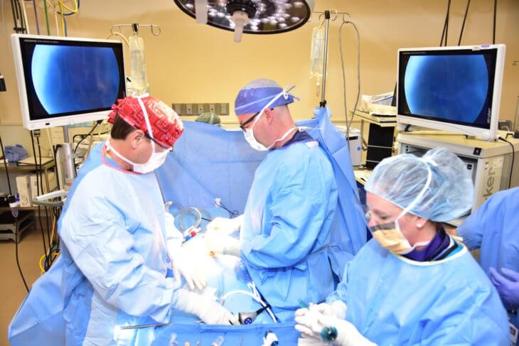 Doctors perform surgery on patient