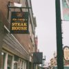 The storefront of Trust Your Butcher Steakhouse in Muncie, Indiana
