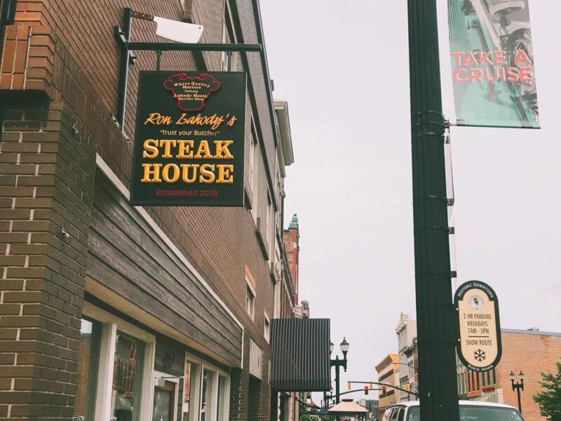 The storefront of Trust Your Butcher Steakhouse in Muncie, Indiana