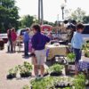 Customers browsing vendor tables at Hartford City Growers and Makers Market in East Central Indiana