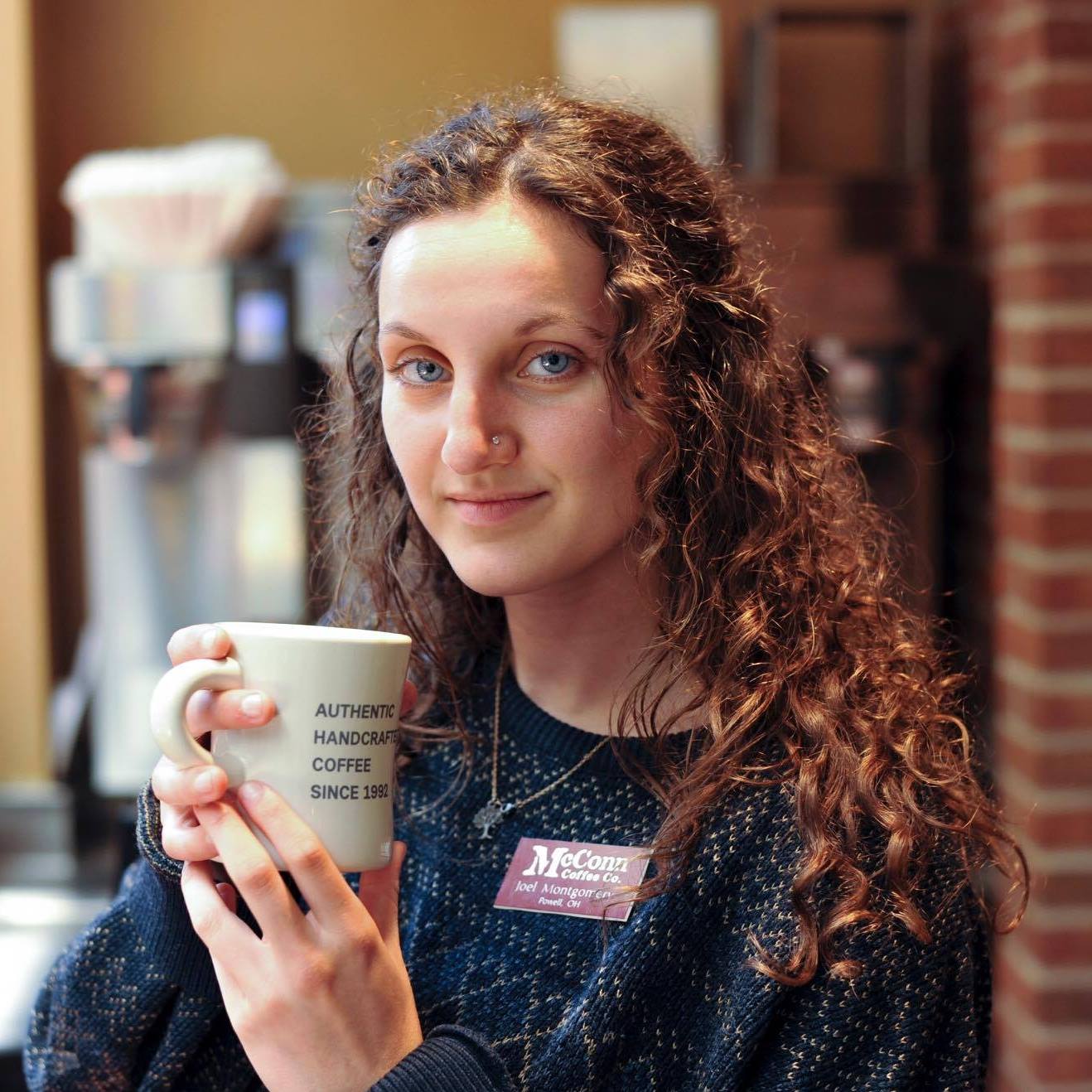 Mikayla Mirazzi with mug of coffee