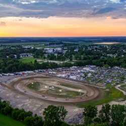 Montpelier Speedway comes to life at sunset, as fans gather for a night of dirt track racing and community tradition.